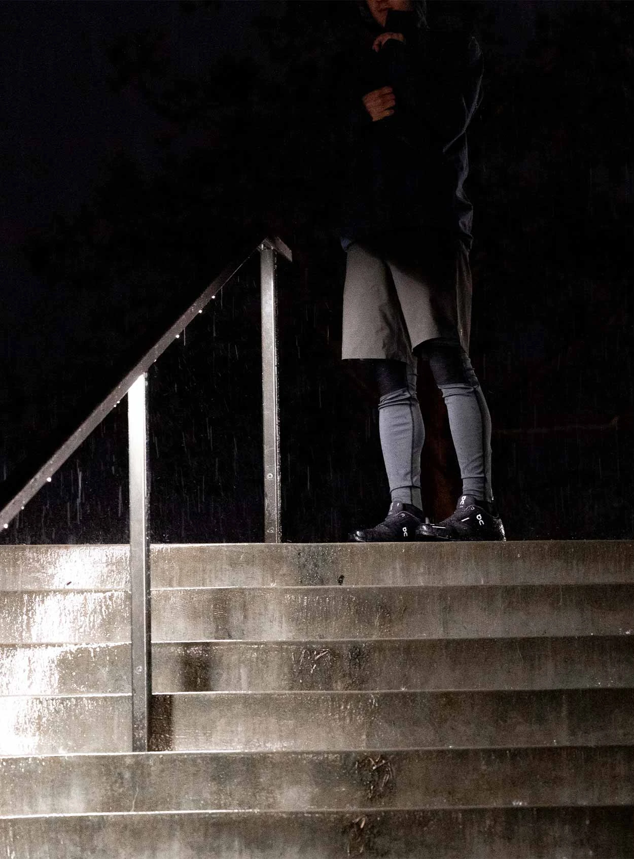 Standing atop the cold stairs