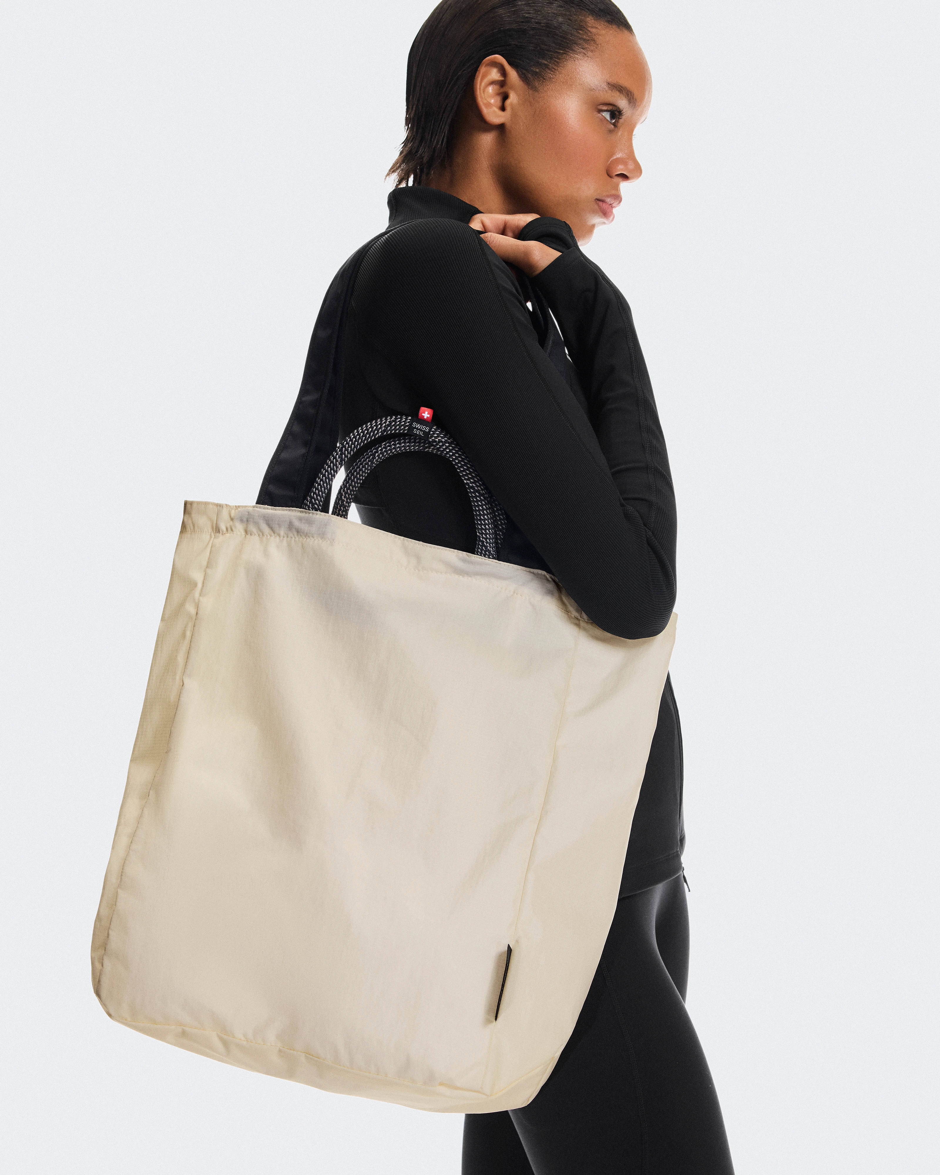 On Tote Pack 25L Cream & Black Unisexe Sacs
