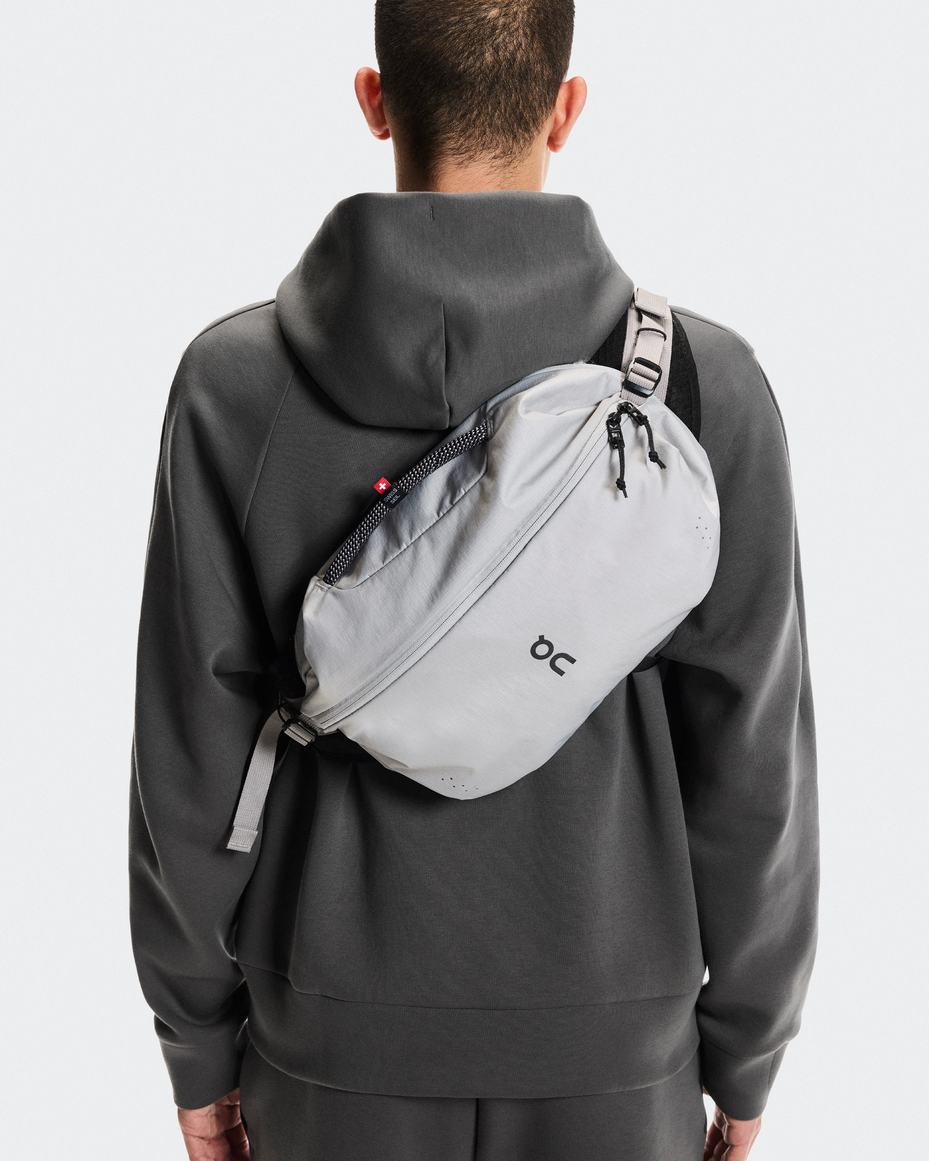 On Sling Pack 9L Glacier & Black Unisexe Sacs
