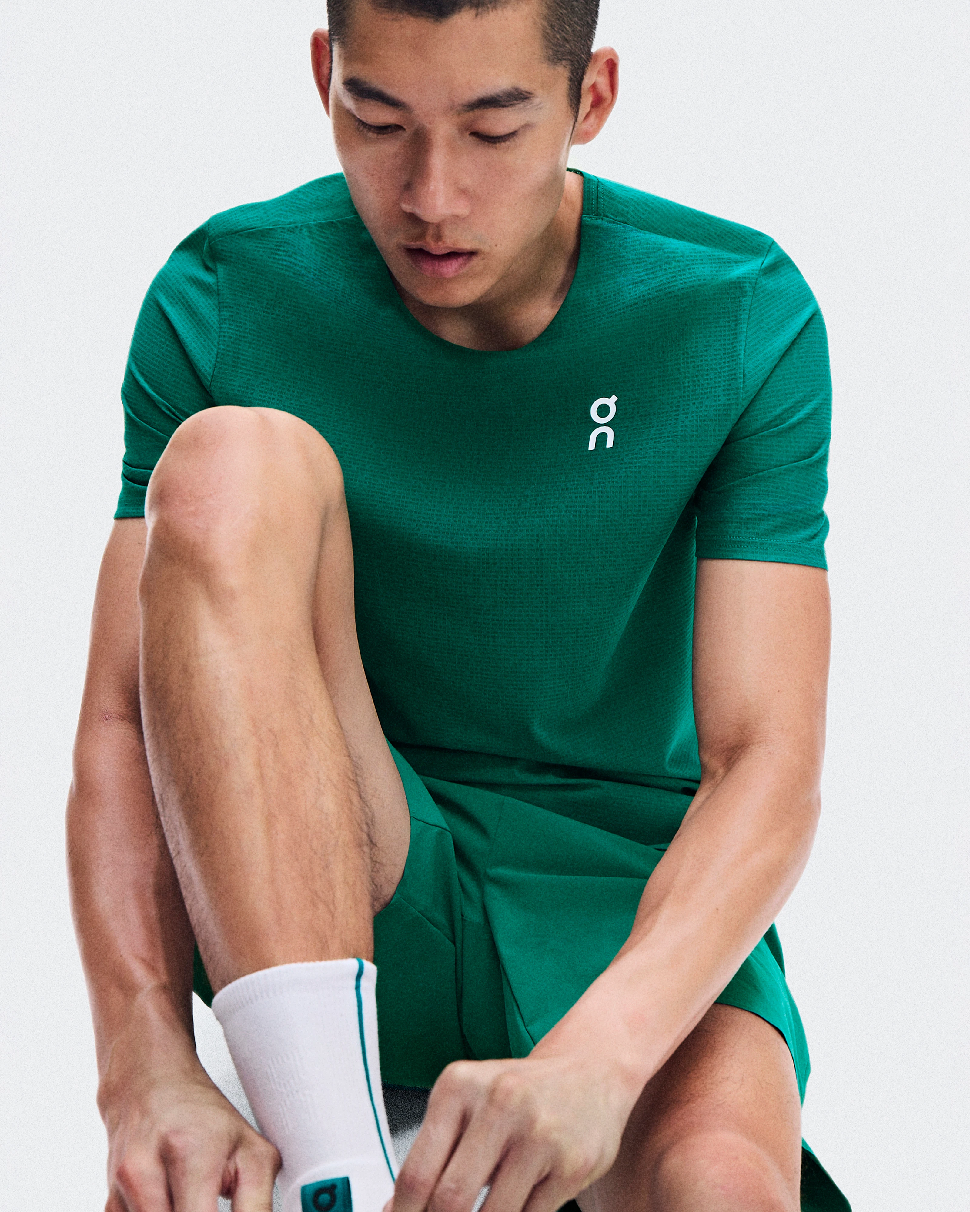 On Court-T Neem Homme Hauts et t-shirts