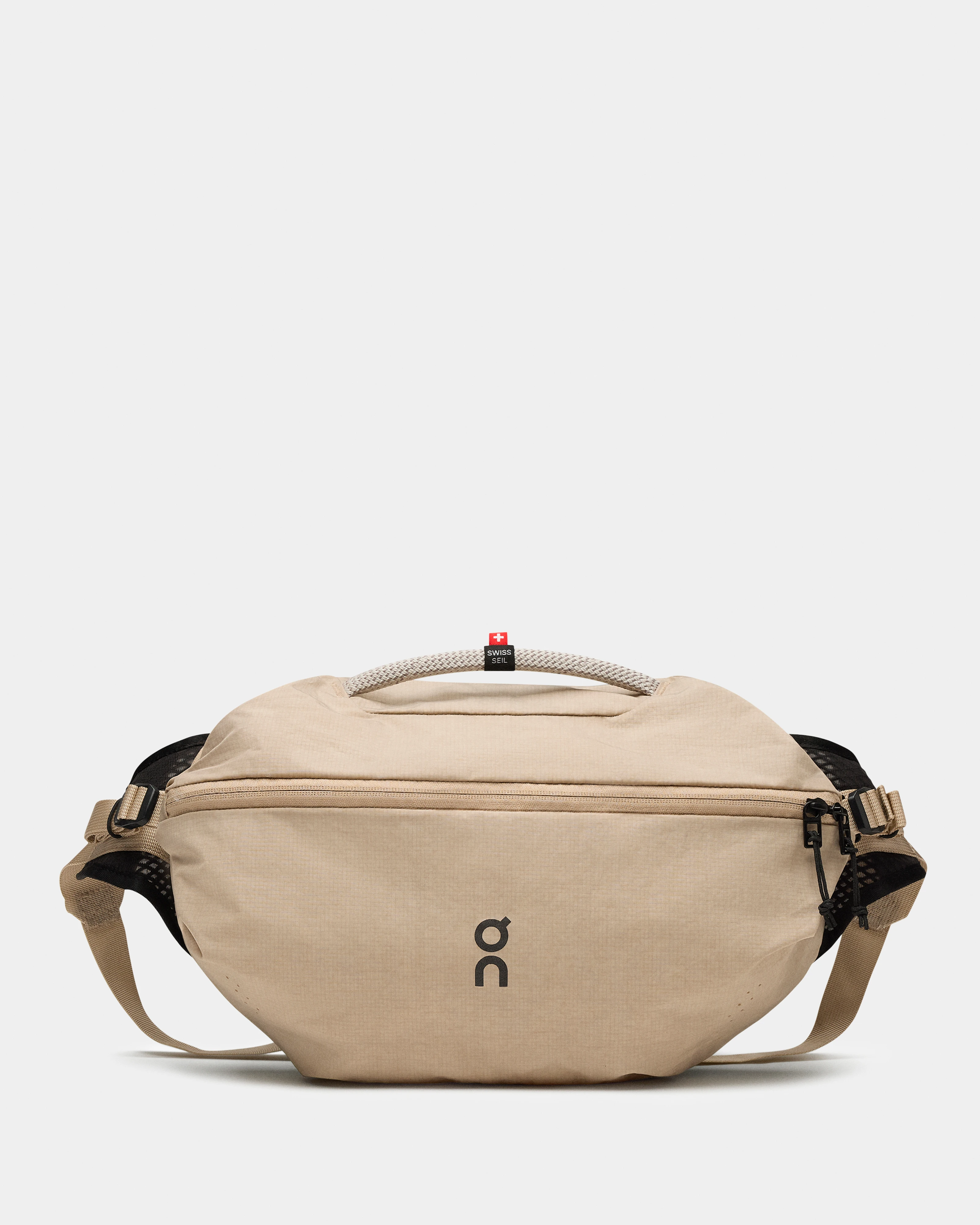 On Sling Pack 9L Sand & Black Unisexe Sacs