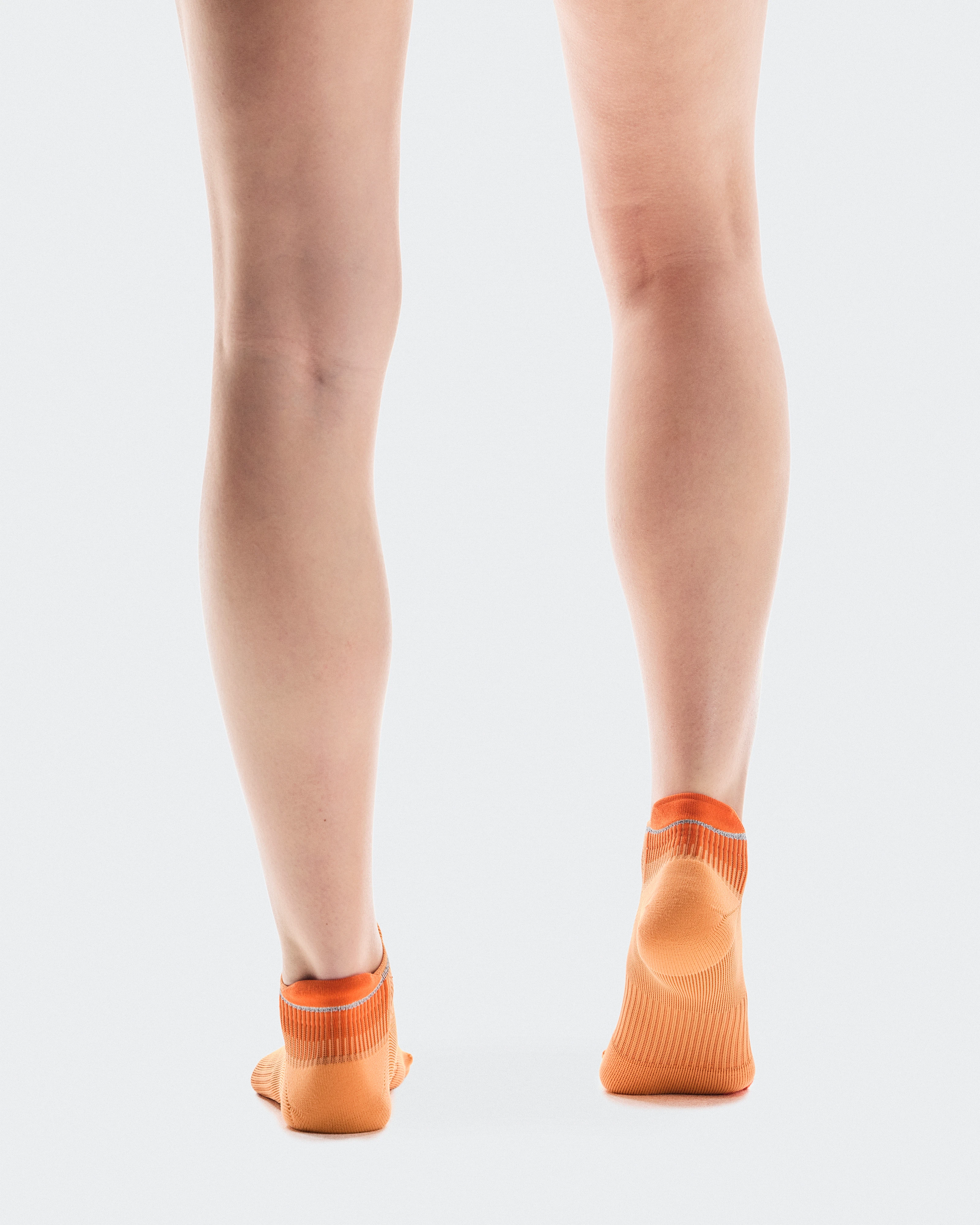 On Performance Run Sock Low Tangerine & Flame Unisexe Chaussettes