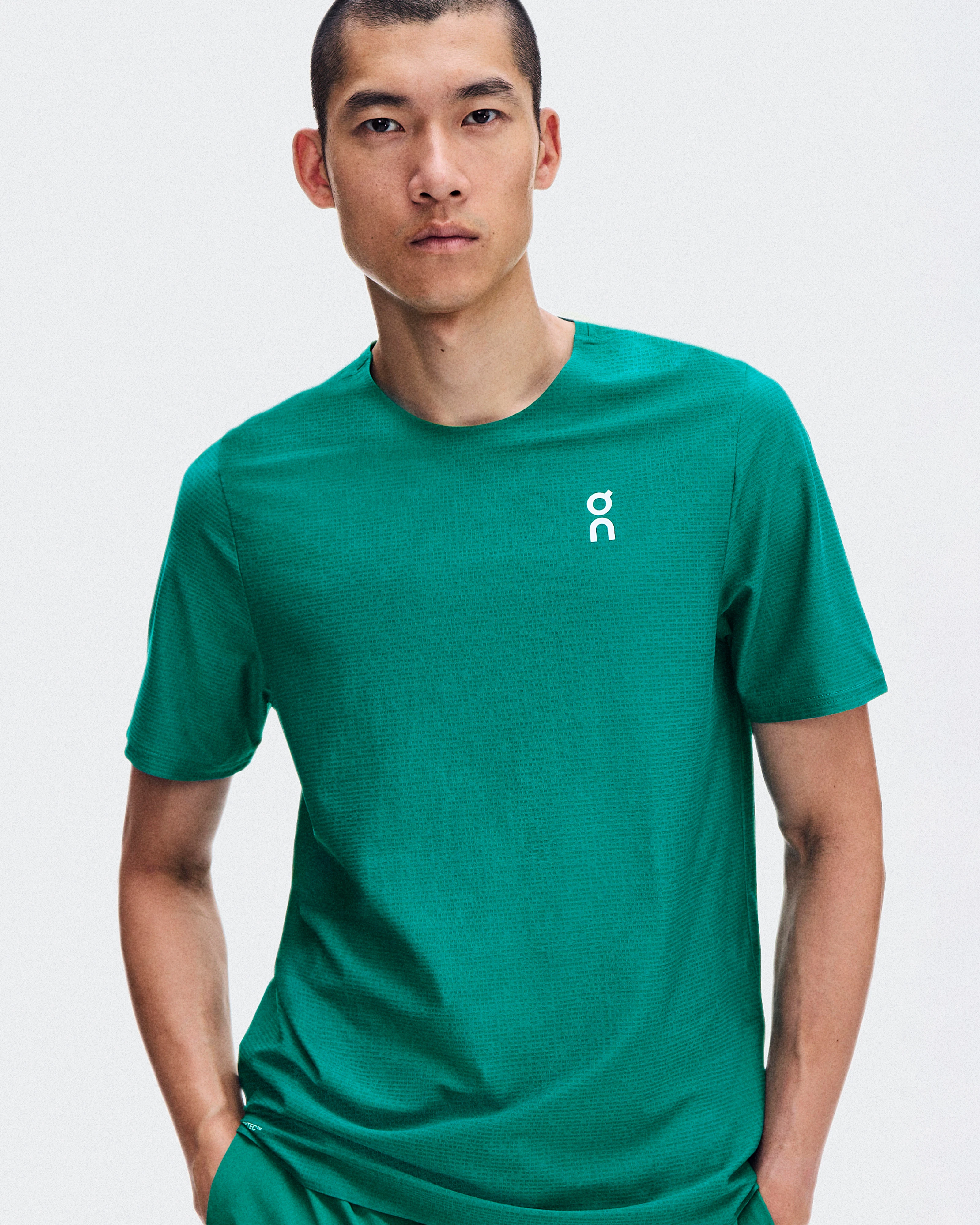 On Court-T Neem Homme Hauts et t-shirts